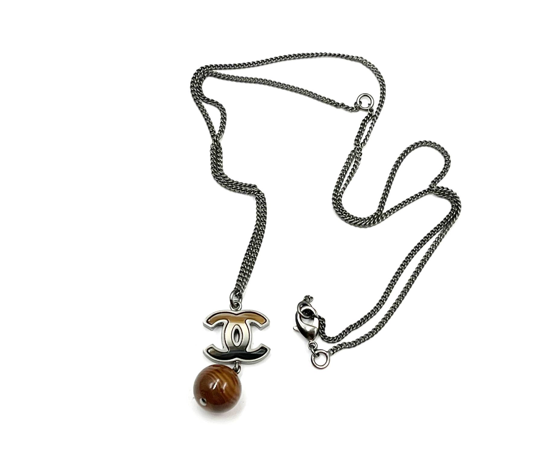 Chanel Silver CC Petrified Wood CC Dangle Pendant Necklace