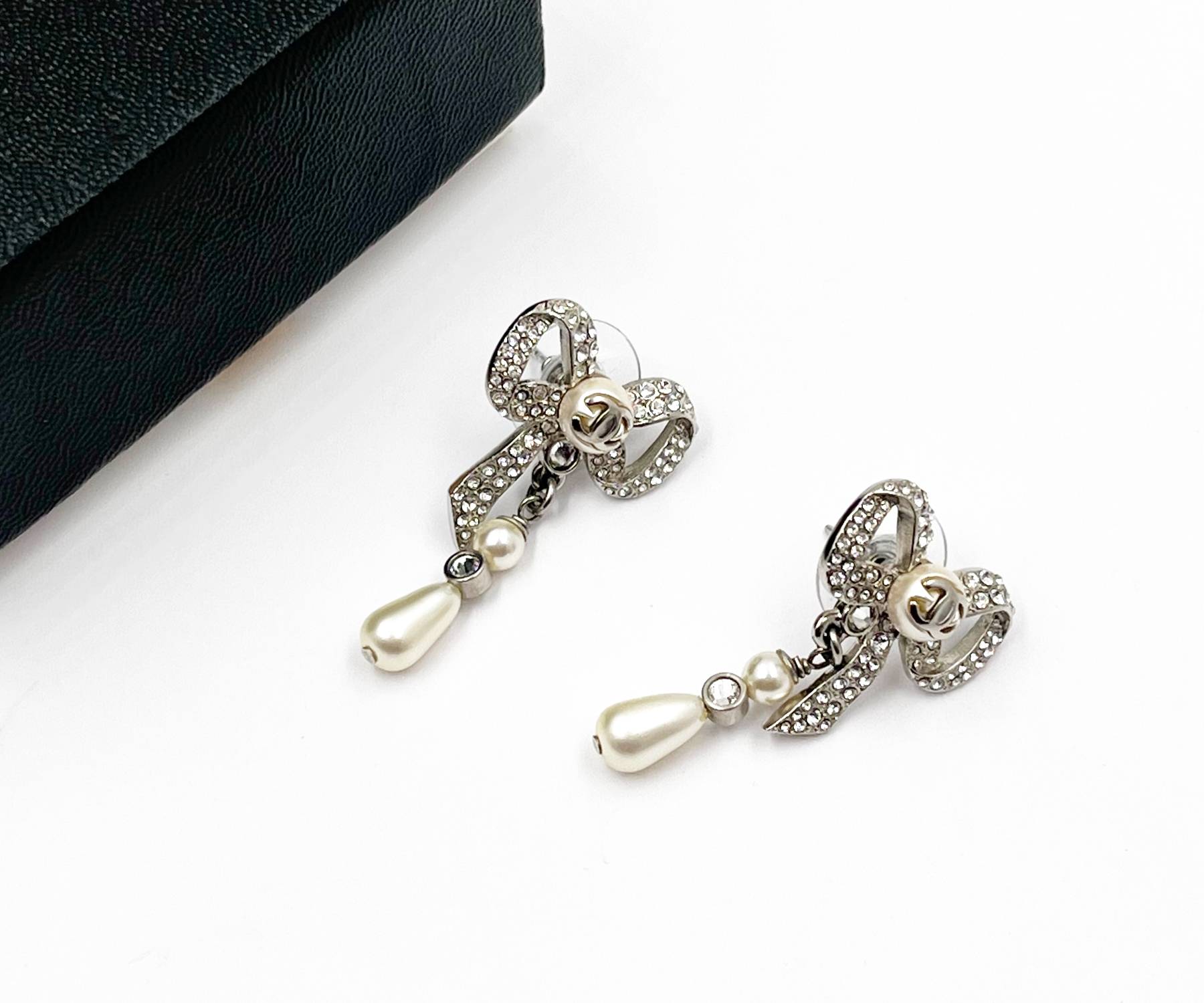 Chanel Silver CC Ribbon Bow Crystal Tear Drop Pearl Piercing Earrings