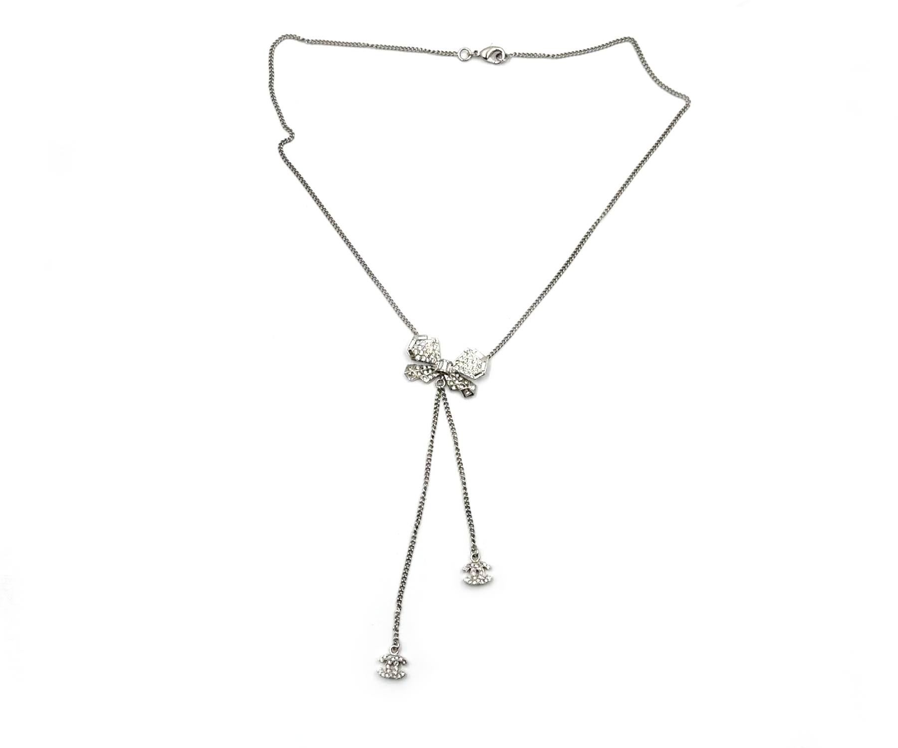 Chanel Silver Ribbon Bow Crystal CC Dangle Pendant Necklace