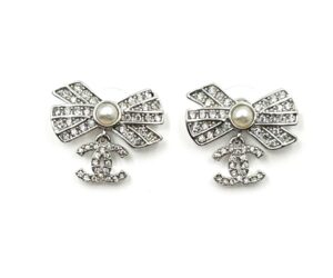 Chanel Silver Ribbon Row CC Crystal Piercing Earrings